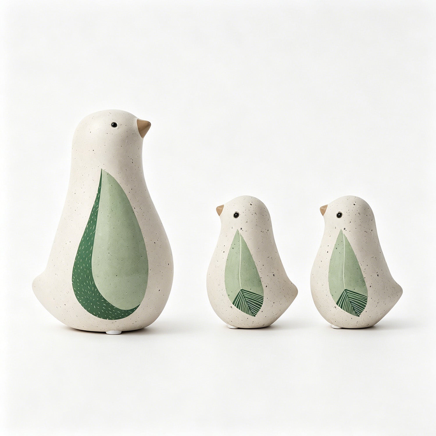 Speckled ceramic bird trio decor set with green leaf motif - image 1